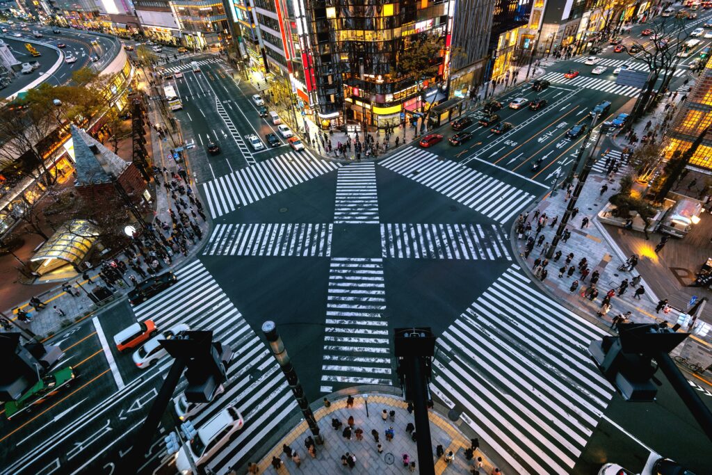 Aerial view of Shibuya Scramble Crossing in Tokyo Japan at night — the city many JET Programme Japan teachers call home