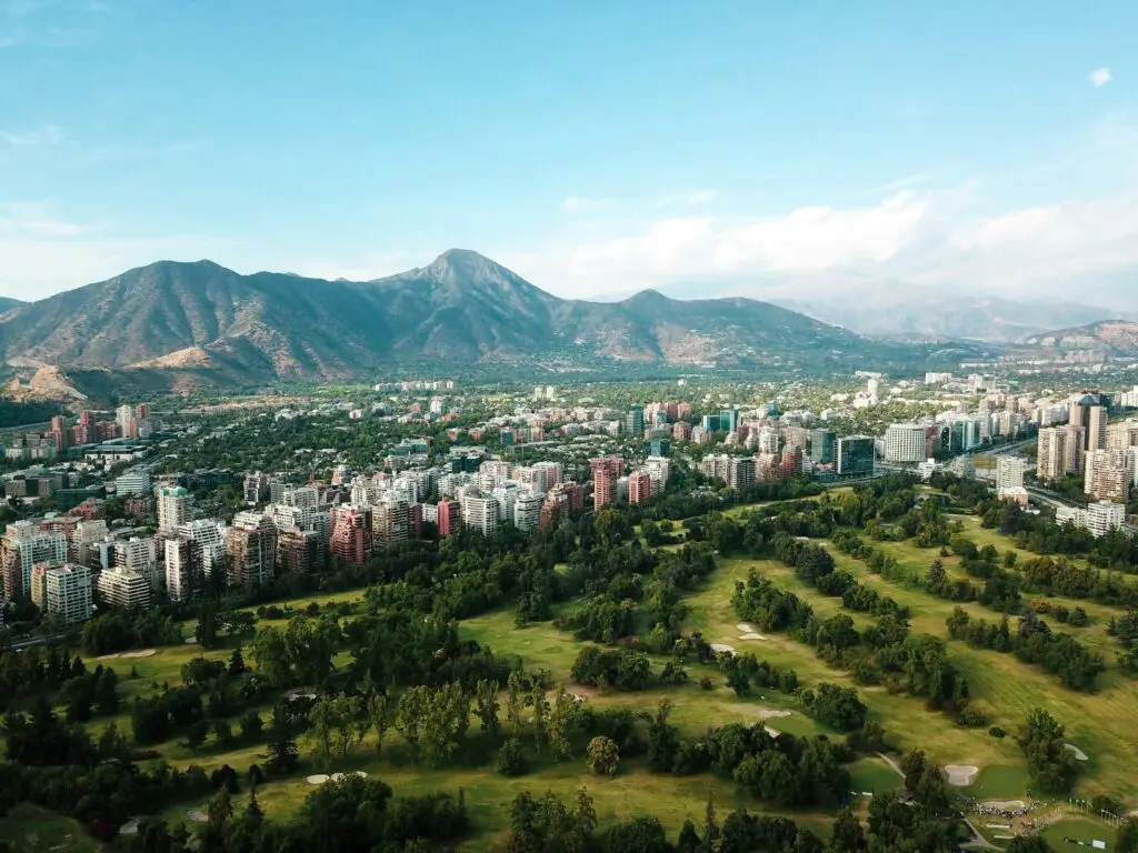 Santiago, Chile skyline with the Andes mountains behind it — English Opens Doors Program