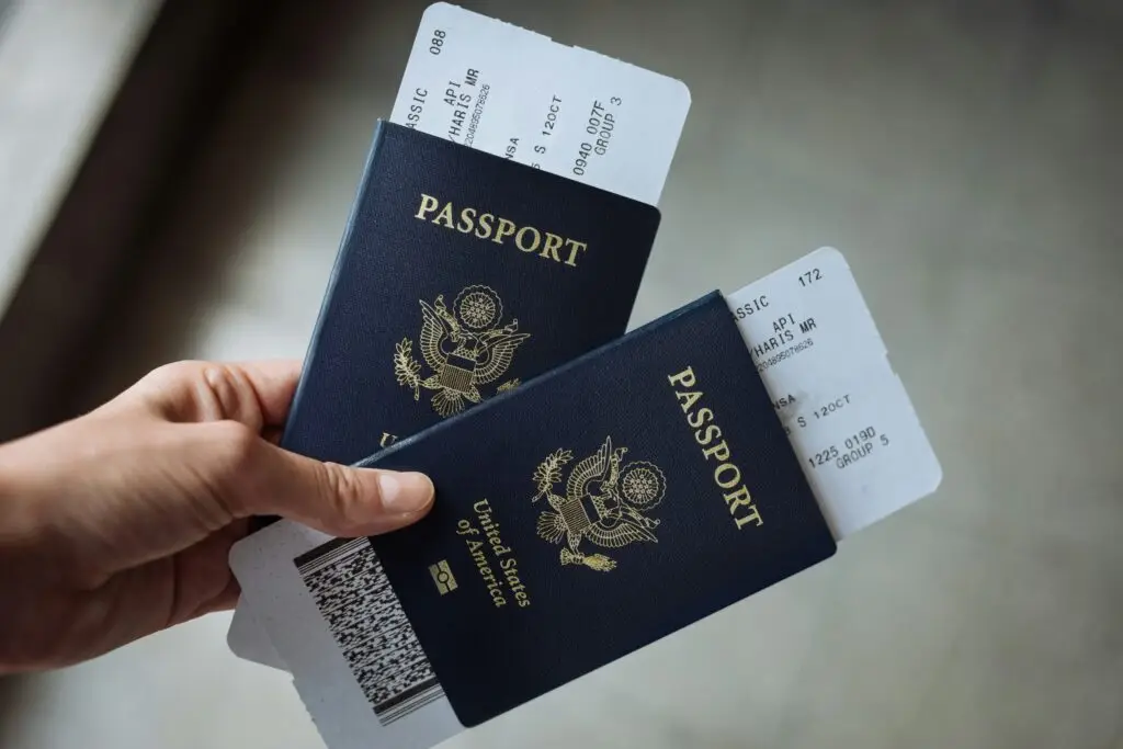 Two US passports and boarding passes — teaching abroad with a partner or family means two sets of paperwork