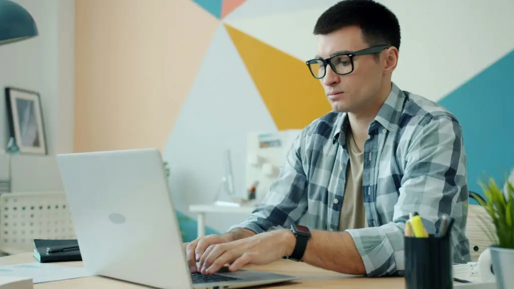 Man reviewing his CV template before applying to international schools