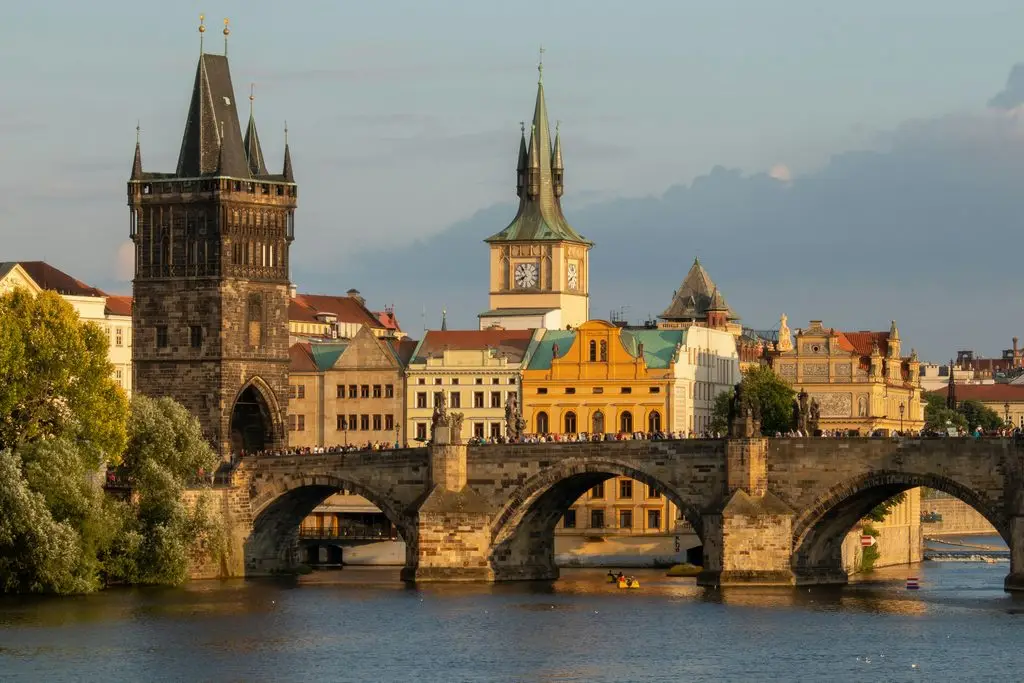 Old Town Bridge Tower and Charles Bridge in Prague at golden hour